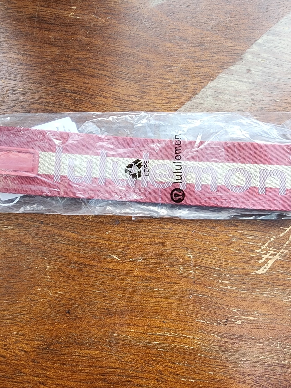 NWT LULULEMON Never Lost Key Chain Wristlet Strap Maroon Red Gold Logo